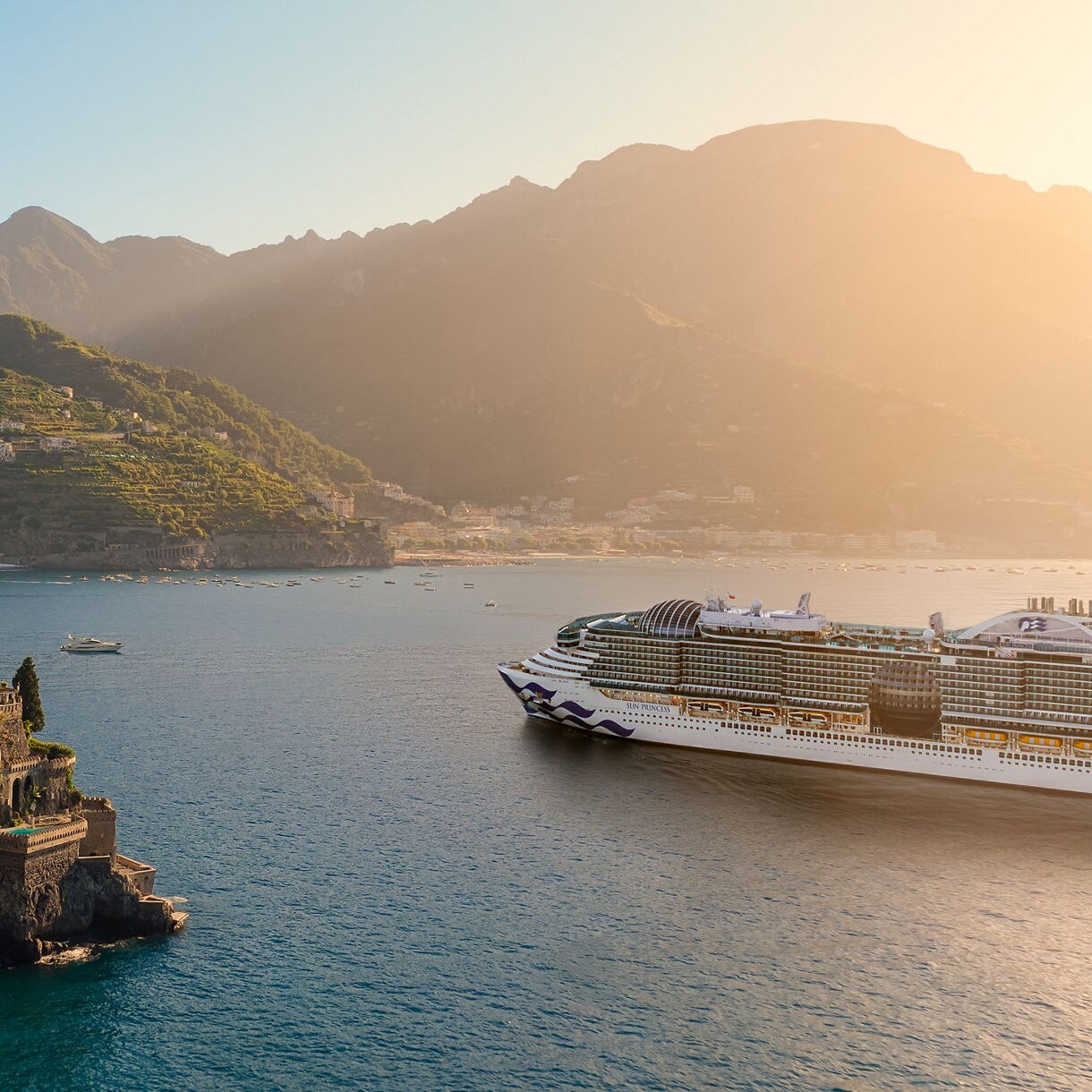 Scenic coastal view with cruise ship.