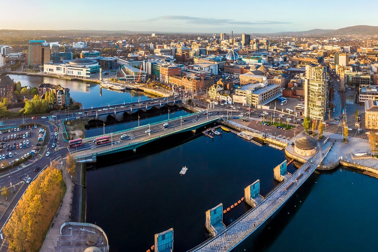 Aerial view of Belfast, Northern Ireland, showing the River Lagan, bridges, modern high-rises and historic buildings