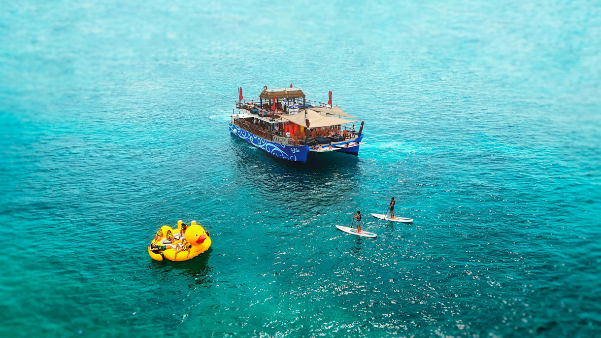 BLU Ocean Boat Club with Unlimited Food, Premium Open Bar & Snorkeling