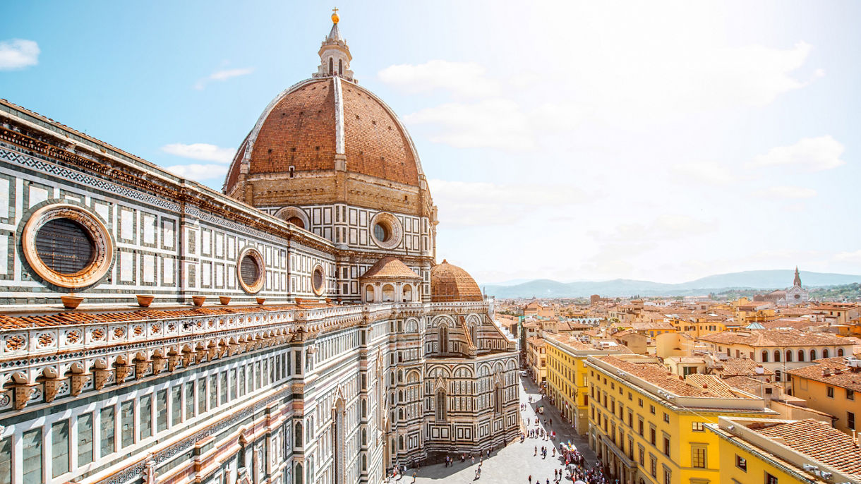 Top cityscape view on the dome of Santa Maria del Fiore church and old town in Florence