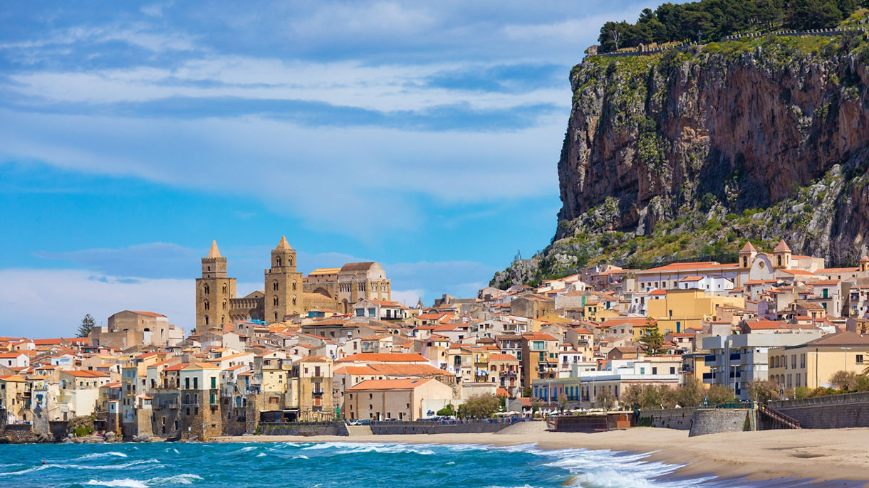 Cefalu is city in Italian Metropolitan City of Palermo located on Tyrrhenian coast of Sicily, Italy. Cefalu is popular travel destination in Italy because of long sandy beach and clear blue sea.