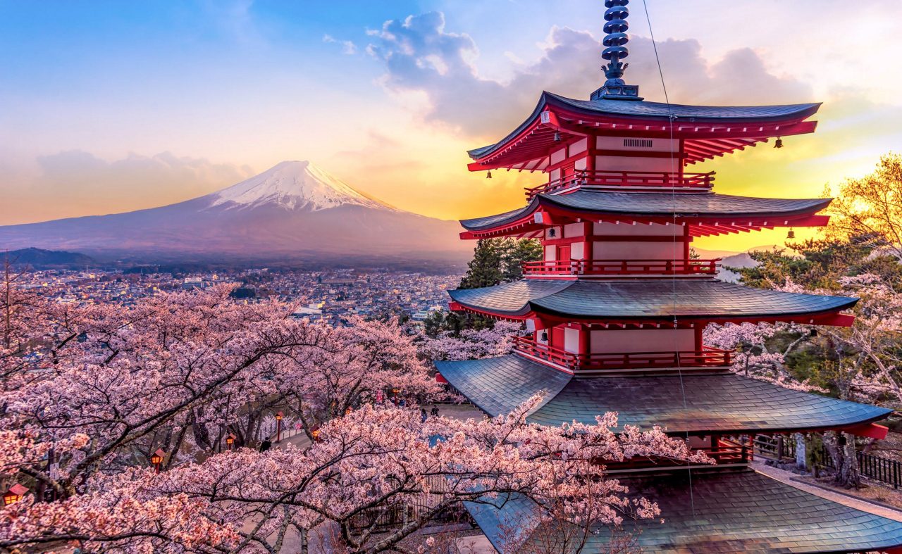 Fujiyoshida, Japan offers a beautiful view of Mount Fuji and Chureito Pagoda at sunset, especially stunning in spring when cherry blossoms frame the iconic landscape.