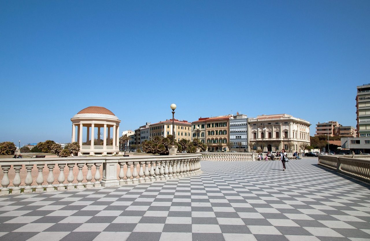 Livorno, Italy's picturesque harbor with historic buildings.
