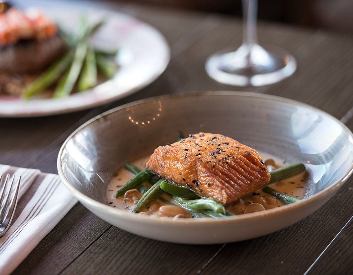  Alaska King salmon served with fresh vegetables.