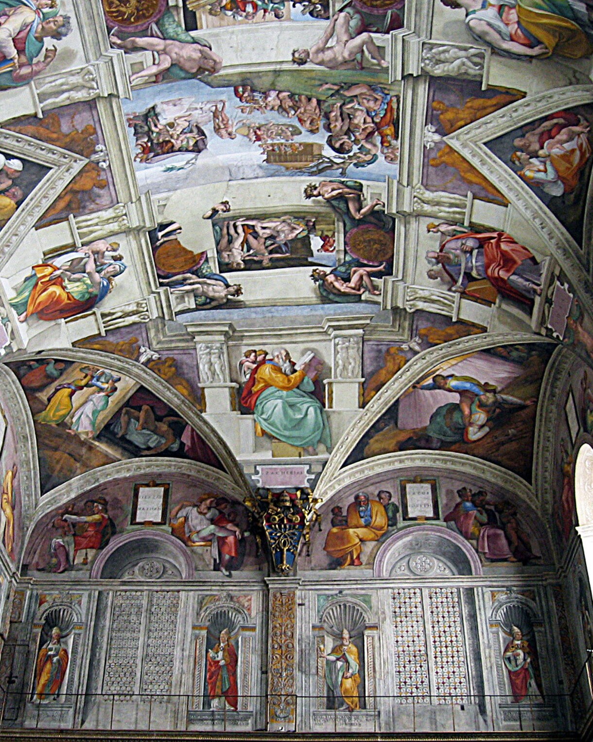 The ornate ceiling of the Sistine Chapel in Vatican City, covered with Michelangelo’s vivid frescoes depicting biblical scenes and figures.