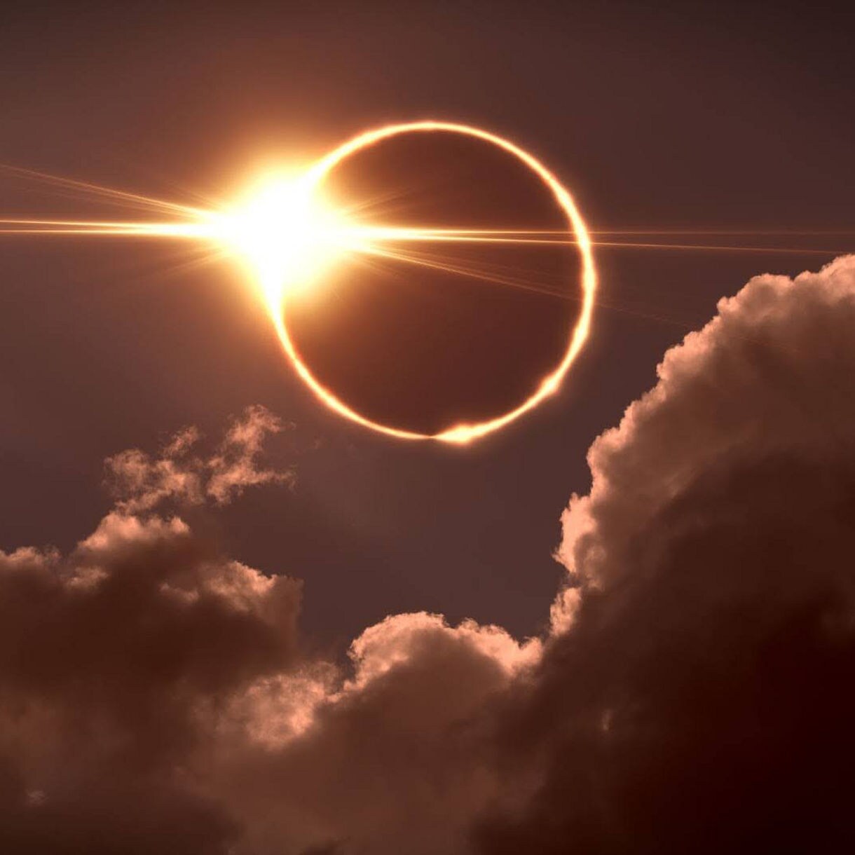 A fiery solar eclipse glowing through thick clouds with a bright flash at the sun’s edge.