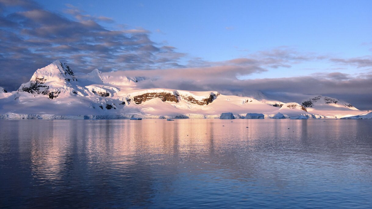 Embrace The Adventurous Side In South America Antarctica With The   Antarctica Gerlache Strait Mountains Illuminated Sunset Ice Glacier Icefield Ocean 16x9