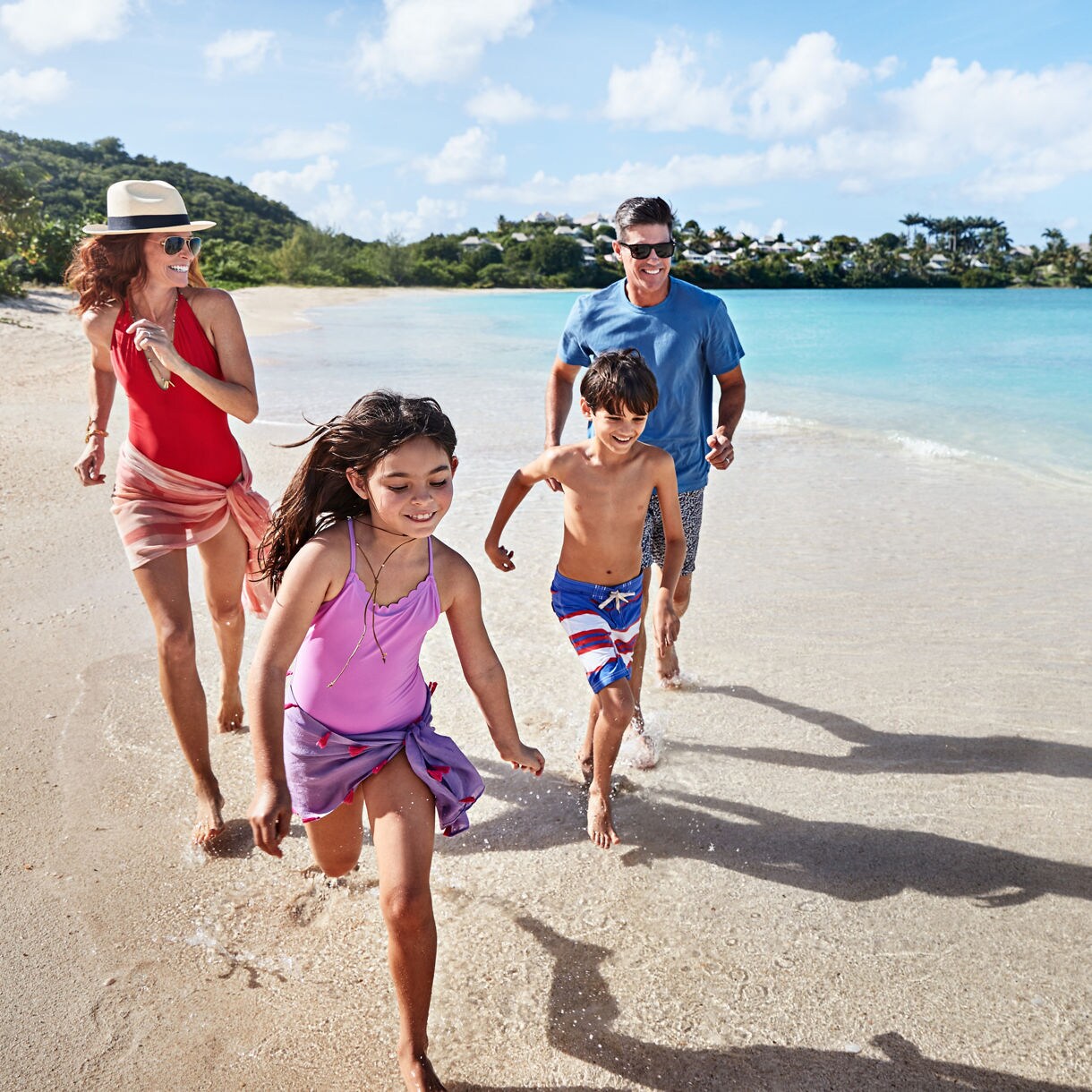 antigua family kids running on beach sand