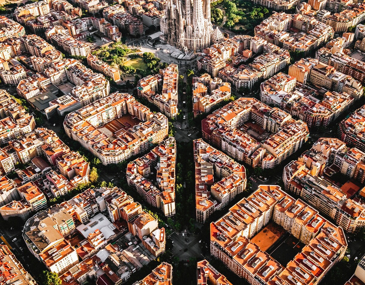 Aerial view of the residential Eixample district of Barcelona, with the Sagrada Familia, Designed by Catalan architect Antoni Gaudi