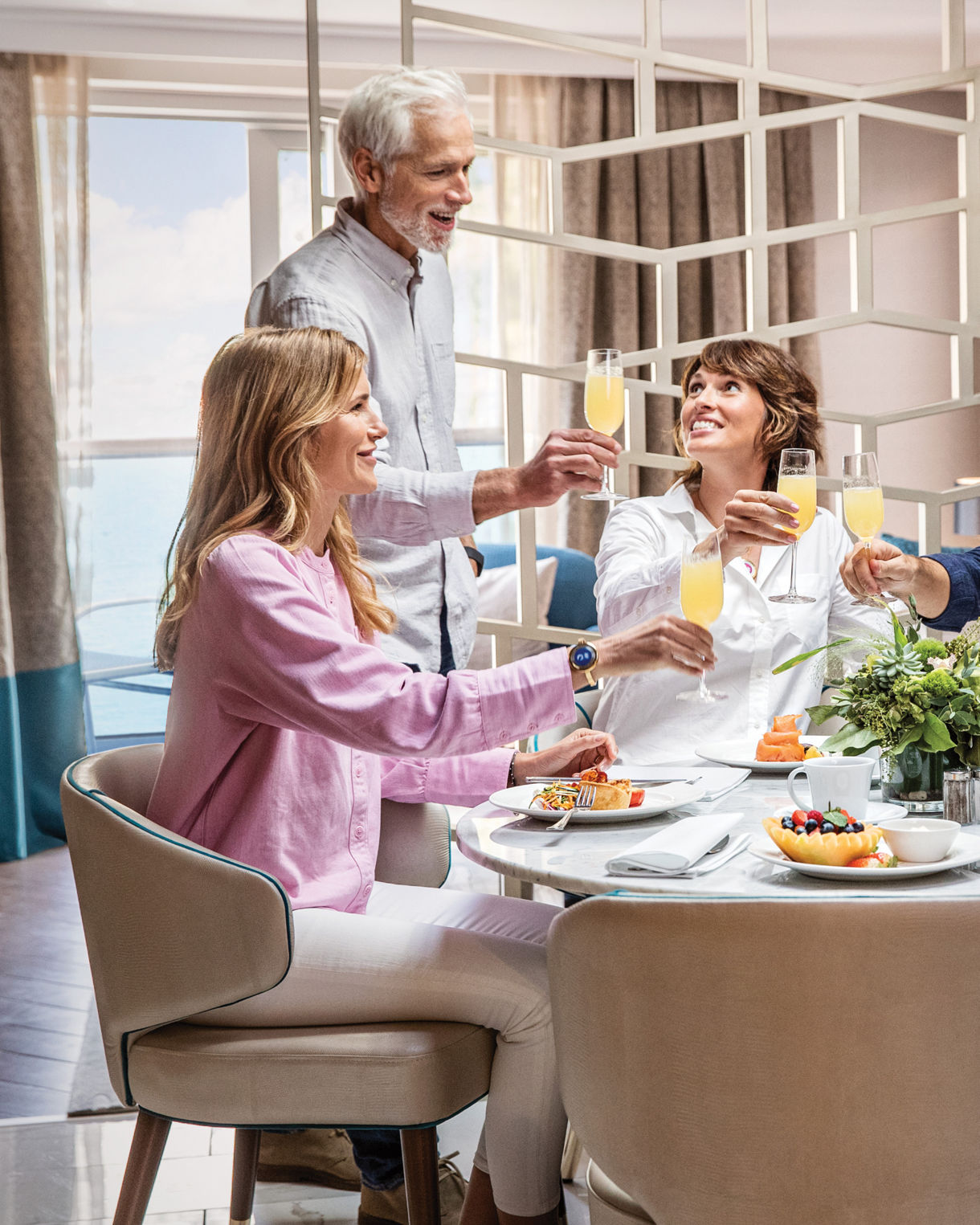 Group of friends having breakfast together