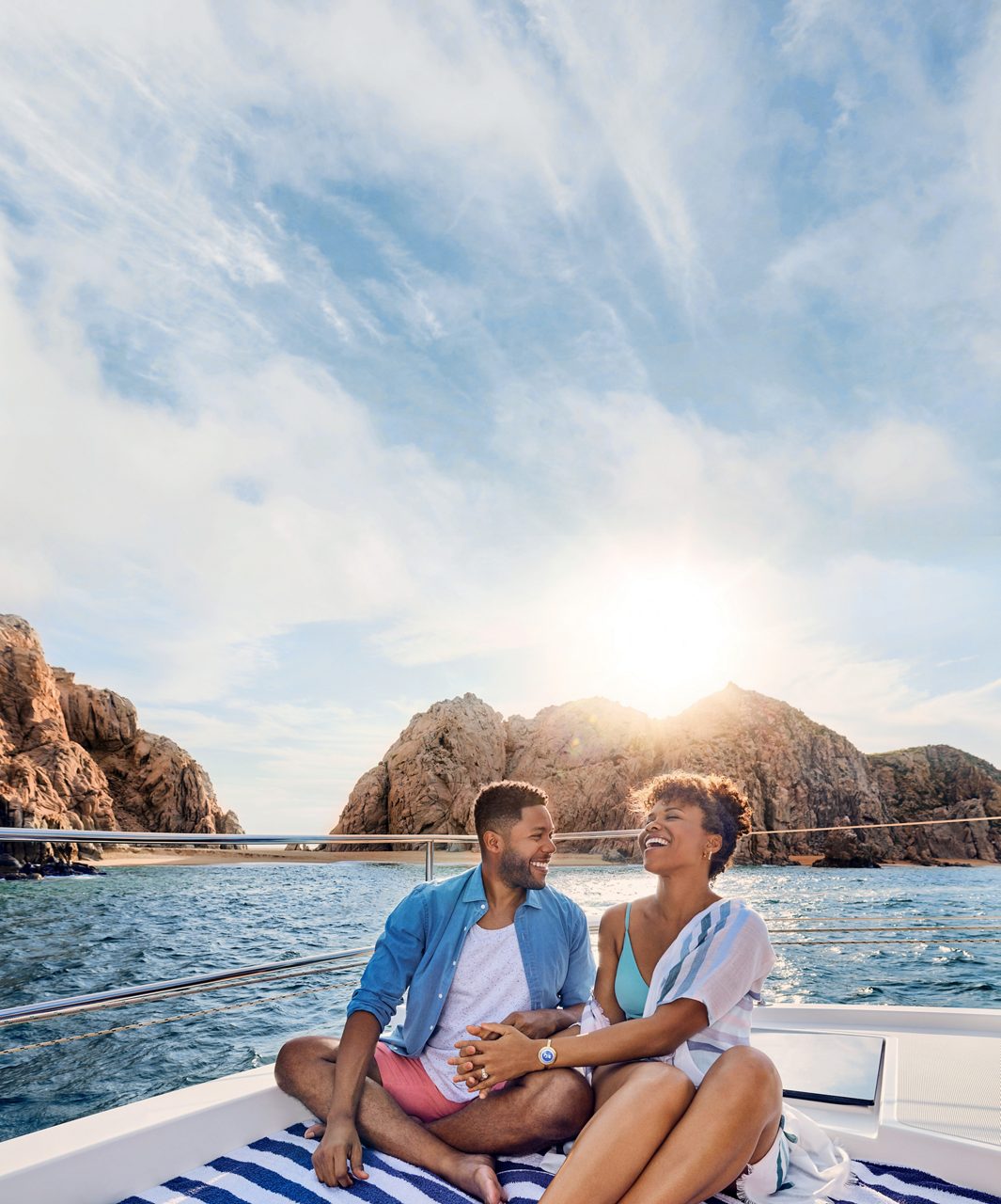 Couple on a boat excursion at El Arco, Cabo San Lucas, Mexico