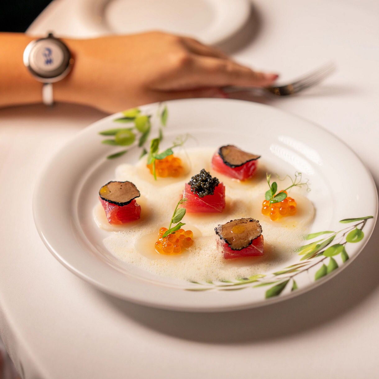 Carpaccio Di Mare Mediterraneo, thoughtfully paired with a Frescobaldi wine, creates a perfect harmony of flavors that elevates every bite.