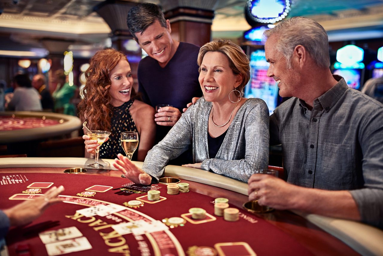 casino guests at blackjack table