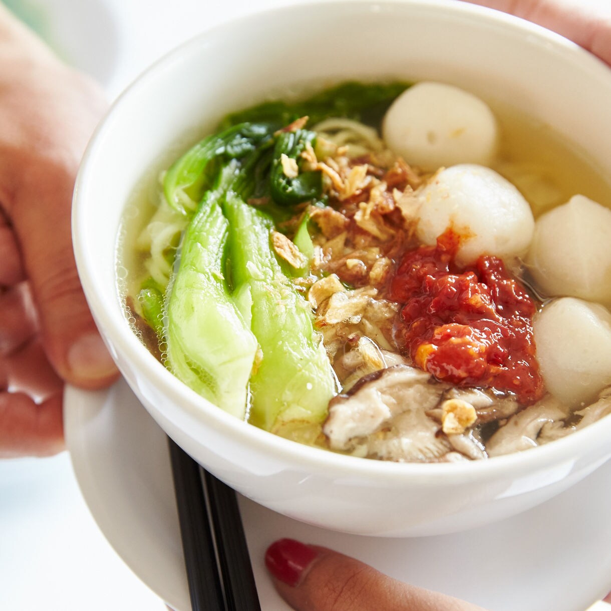 Soup bowl closeup. Chopsticks Noodle Bar