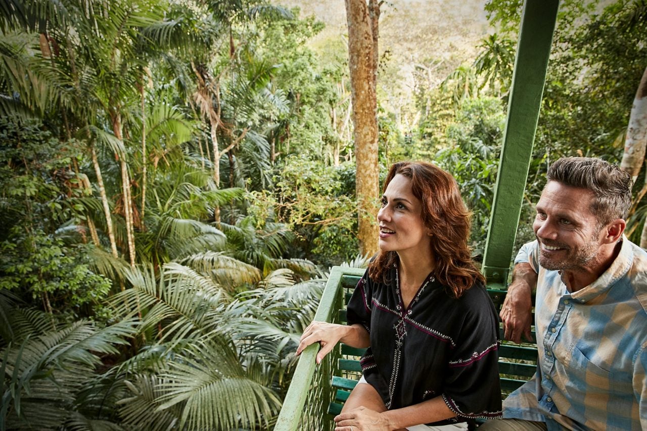 colombia south america couple aerial tram trees