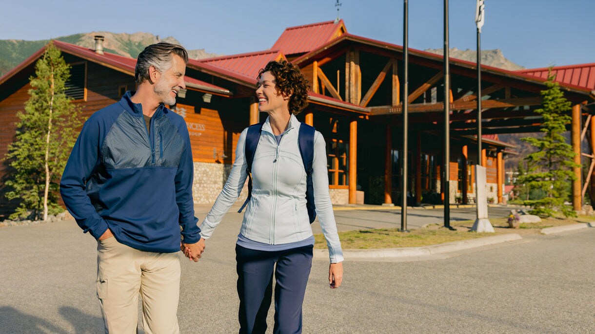 Guests walking the grounds of Denali Princess Wilderness Lodge