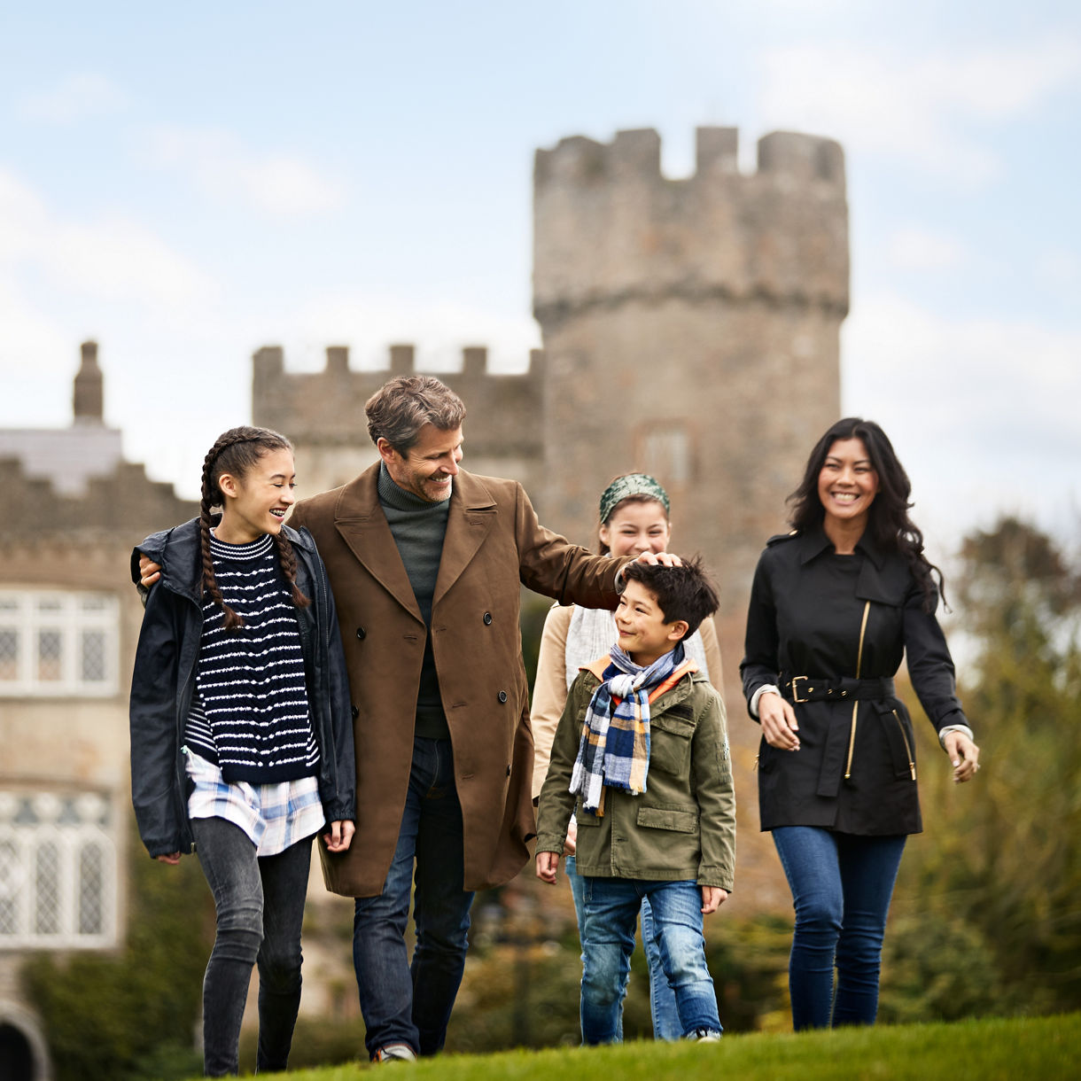 A family walking towards Dublin Castle, Ireland.