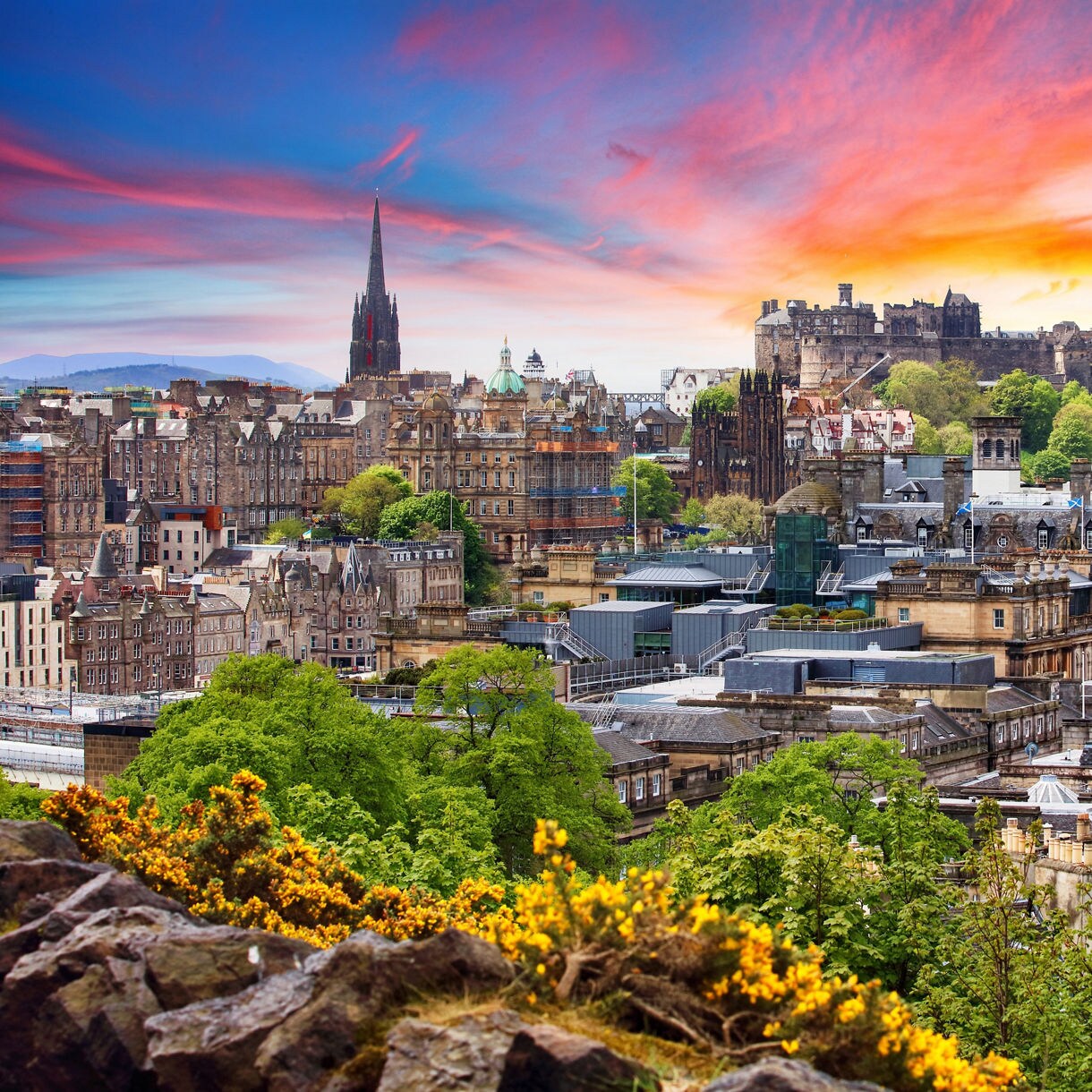 Edinburgh cityscape with historic skyline at sunset