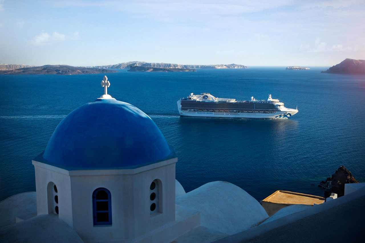 Emerald Princess sailing in Santorini in Greece.