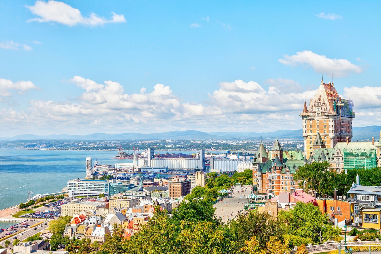 Château Frontenac rising above Old Québec with the St. Lawrence River in the background.