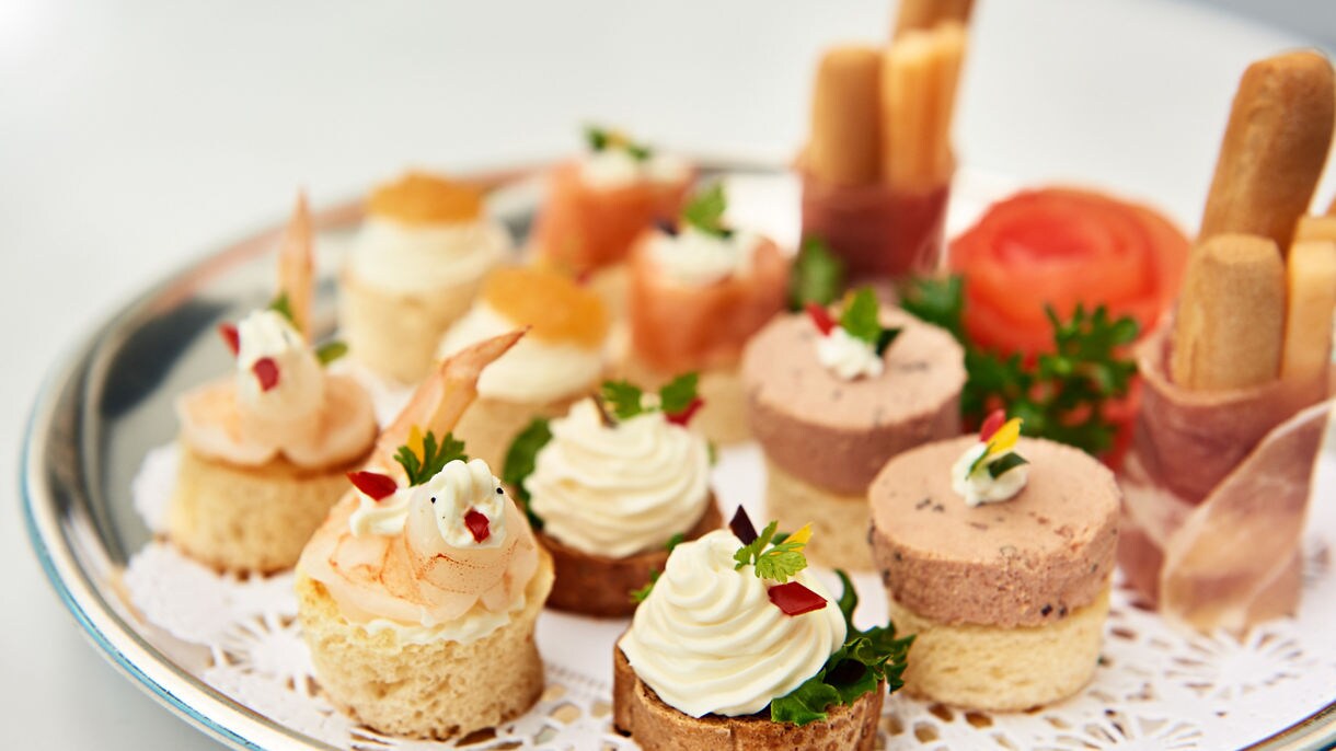 https://assets.princess.com/is/image/princesscruises/food-tea-sandwiches-appetizers-and-pate:16x9?ts=1698255059249