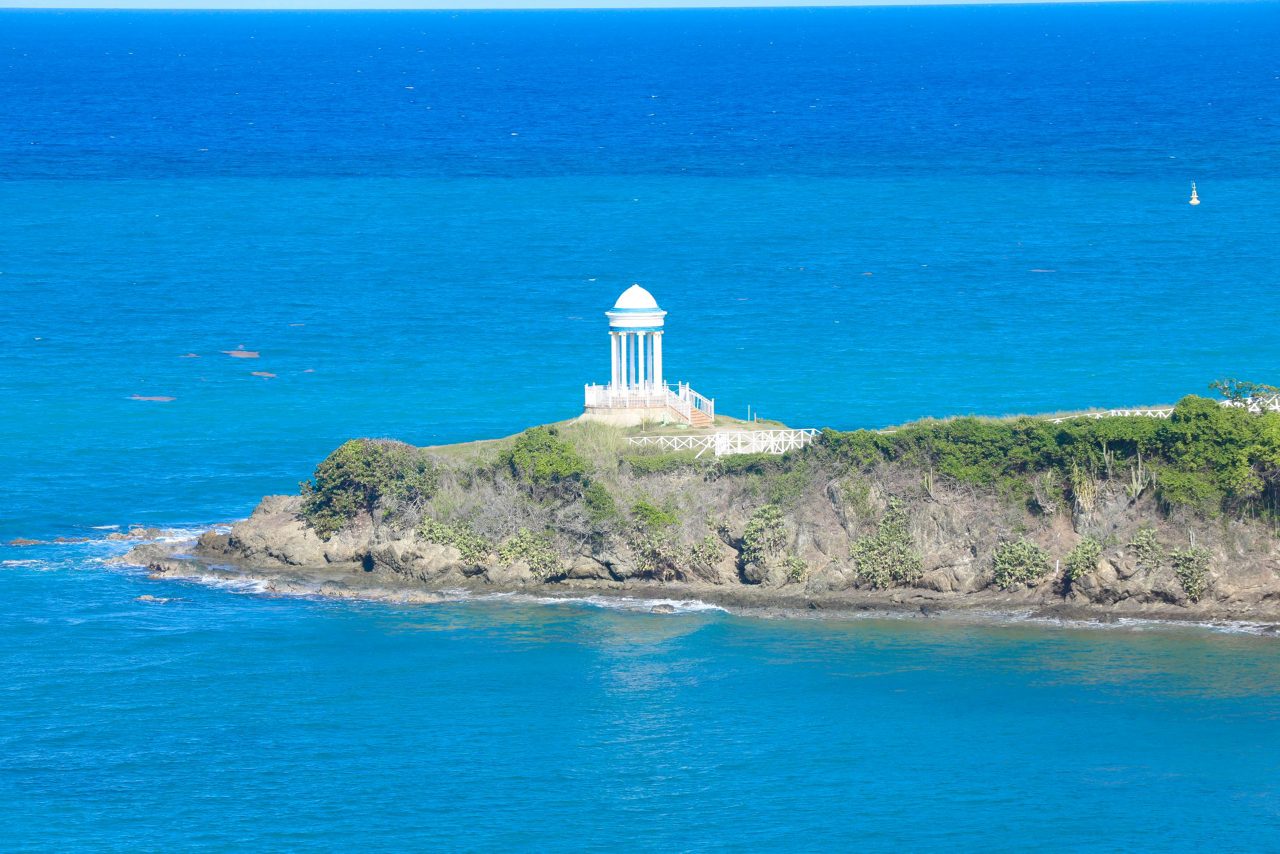 Temple of All Faiths monument on cliff overlooking Caribbean Sea at Amber Cove cruise port in Dominican Republic.