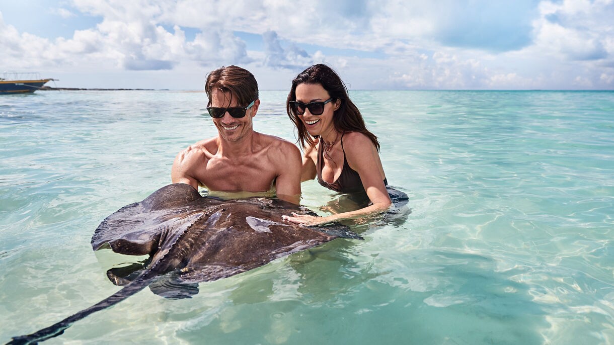 Grand turk caribbean stingray encounter couple ocean