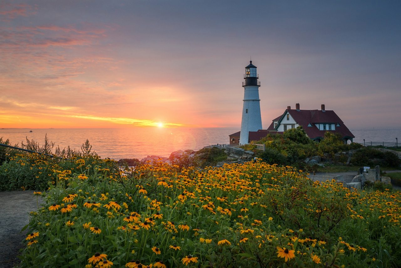 Maine's iconic Portland Head Light at sunset.