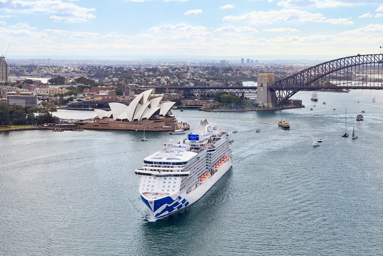 A Princess ship navigates Sydney Harbour, framed by Australia's most famous landmarks.