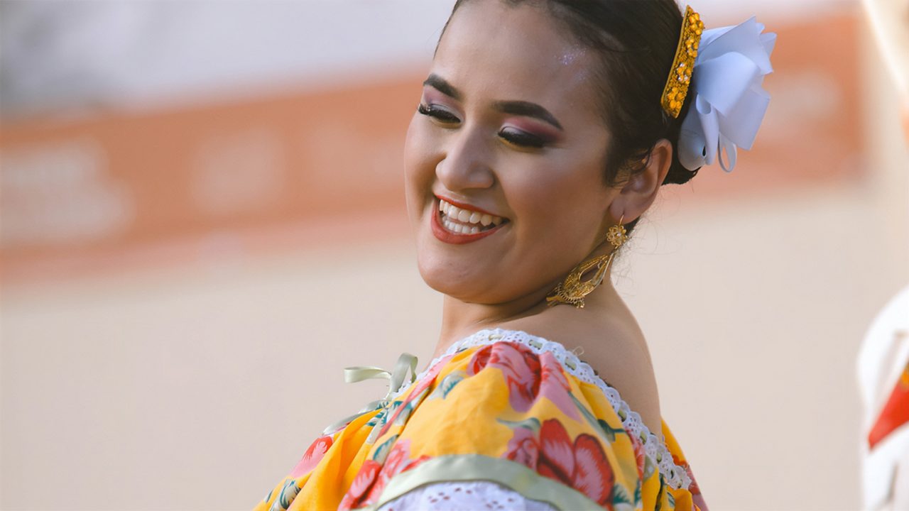 Mexico folkloric dancer woman close up.