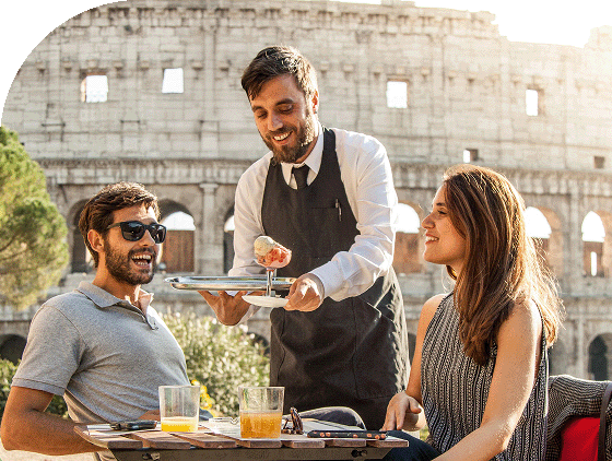 A couple enjoys fine dining in Rome.