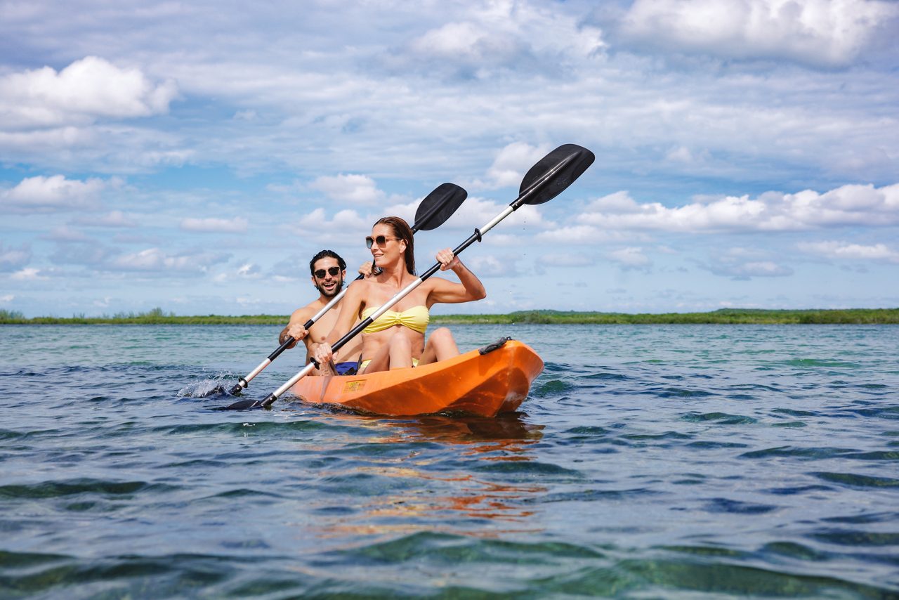 Couple kayaking in Princess Cays®, Bahamas.