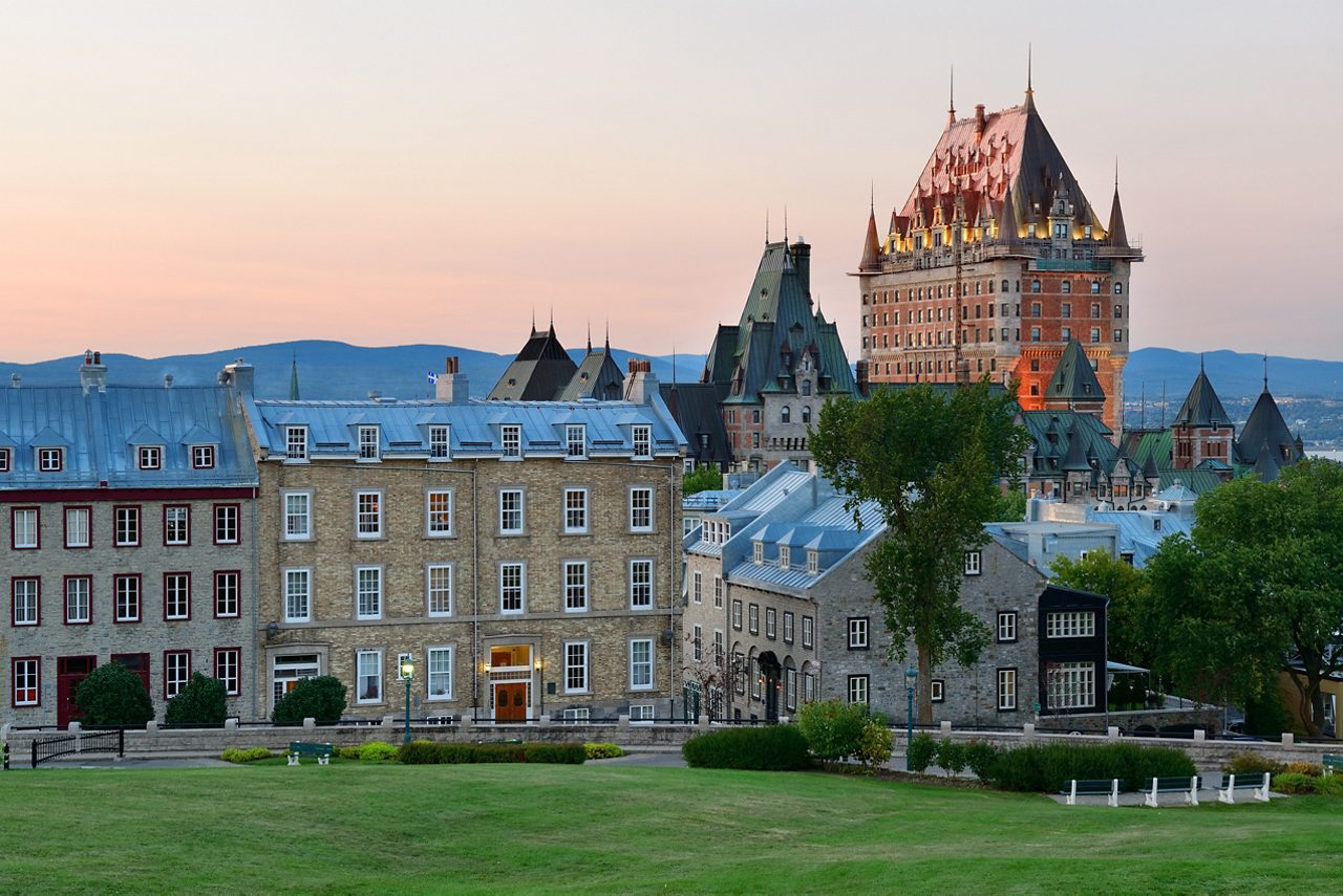 Québec City's historic skyline, vibrant at dusk.
