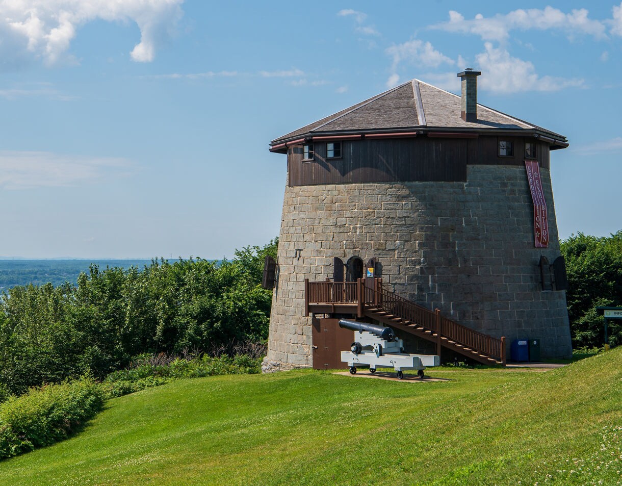 Stone Martello tower with cannon on the Plains of Abraham overlooking the St. Lawrence River.