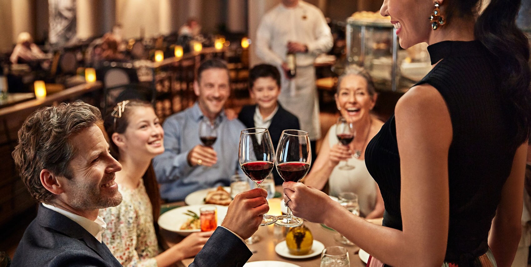 Family sharing a meal and celebrating together