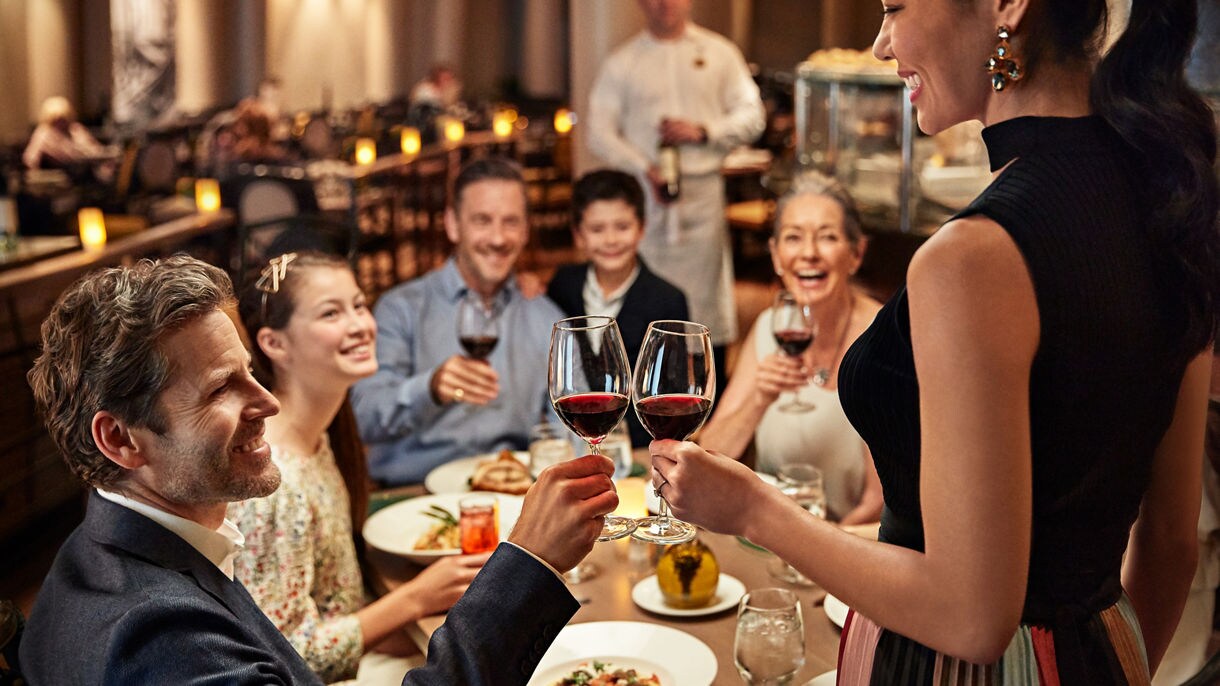 family sharing a meal and celebrating together