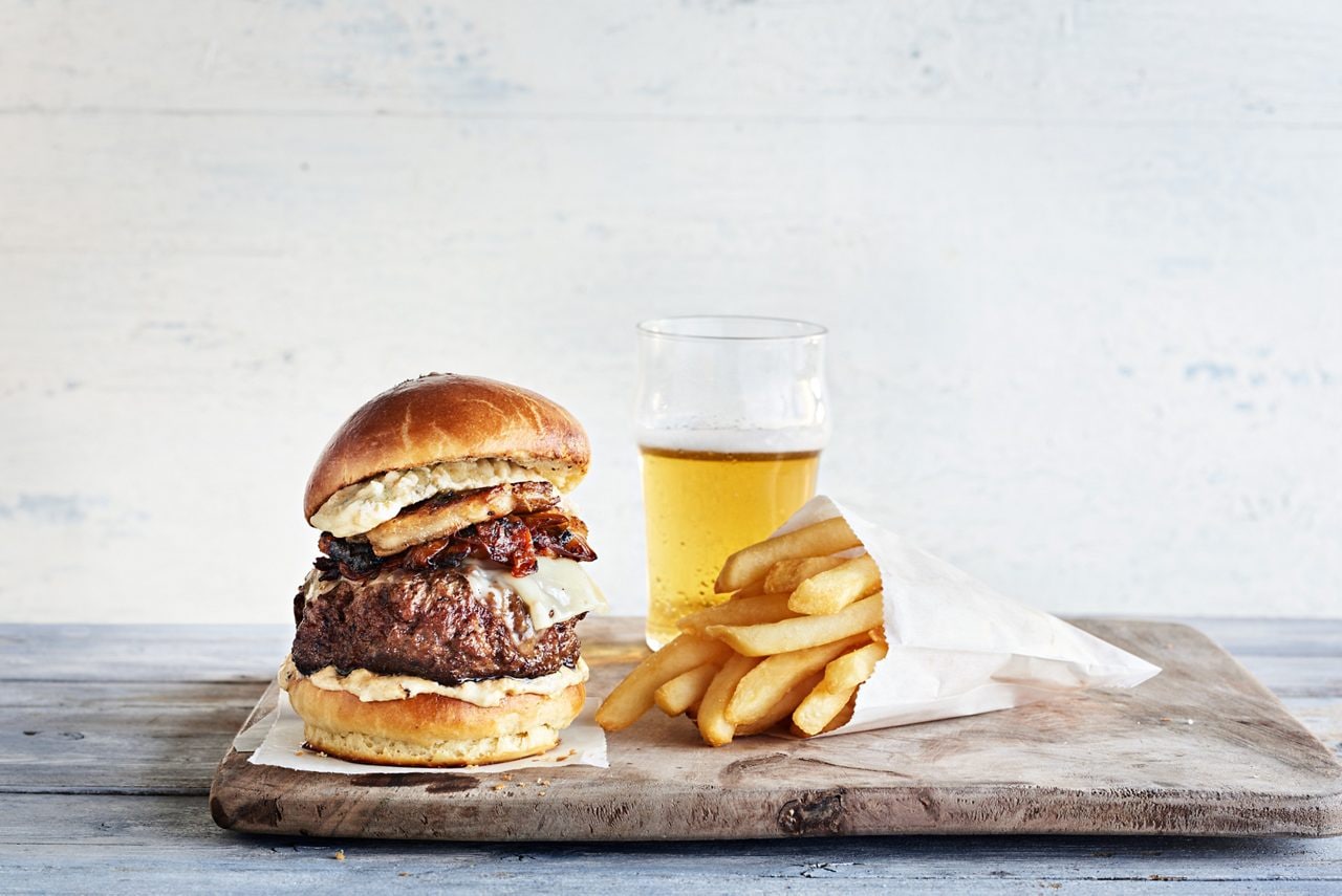 A burger, beer and fries presented at Salty Dog Gastropub. 