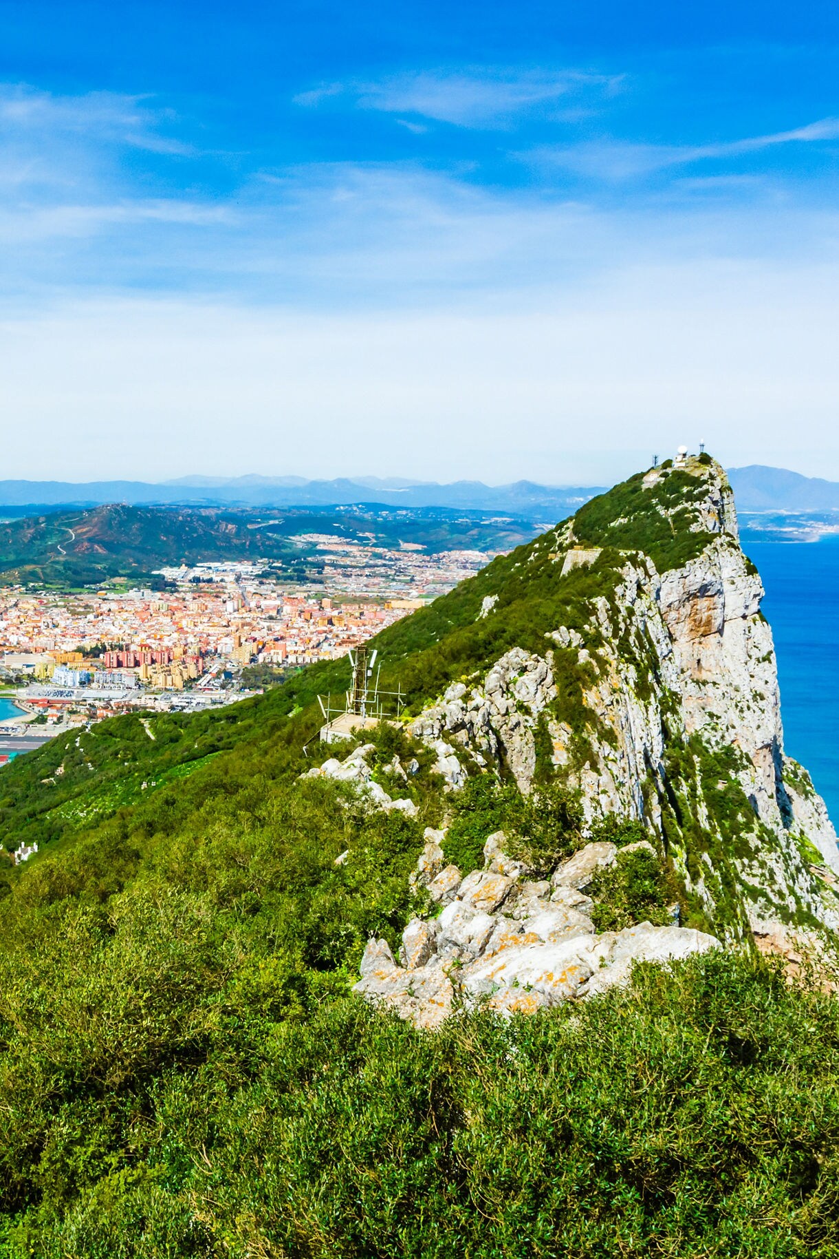 Gibraltar Rock view from above, on the left Gibraltar town and bay, La Linea town in Spain