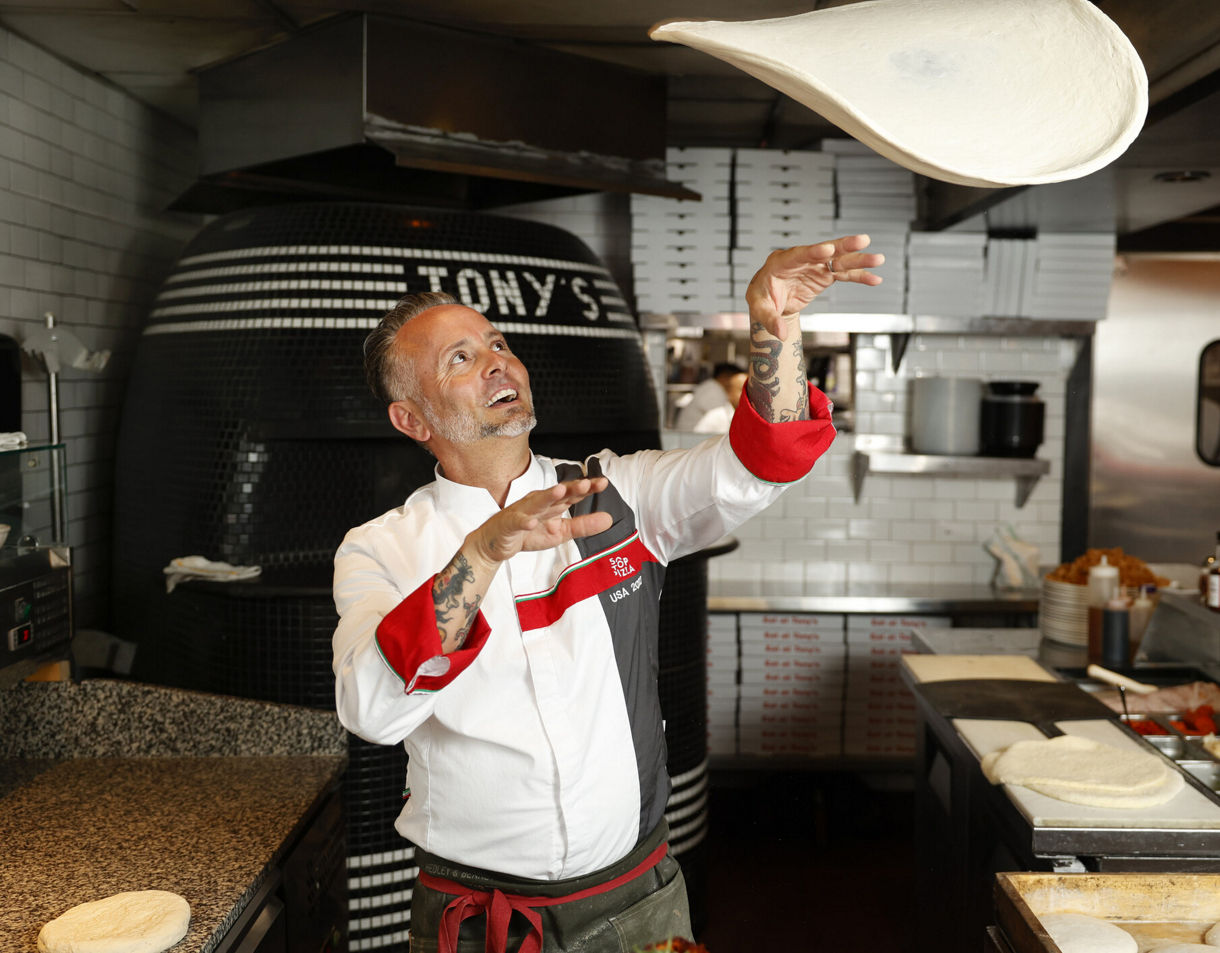 Celebrity chef Tony Gemignani preparing signature pizza