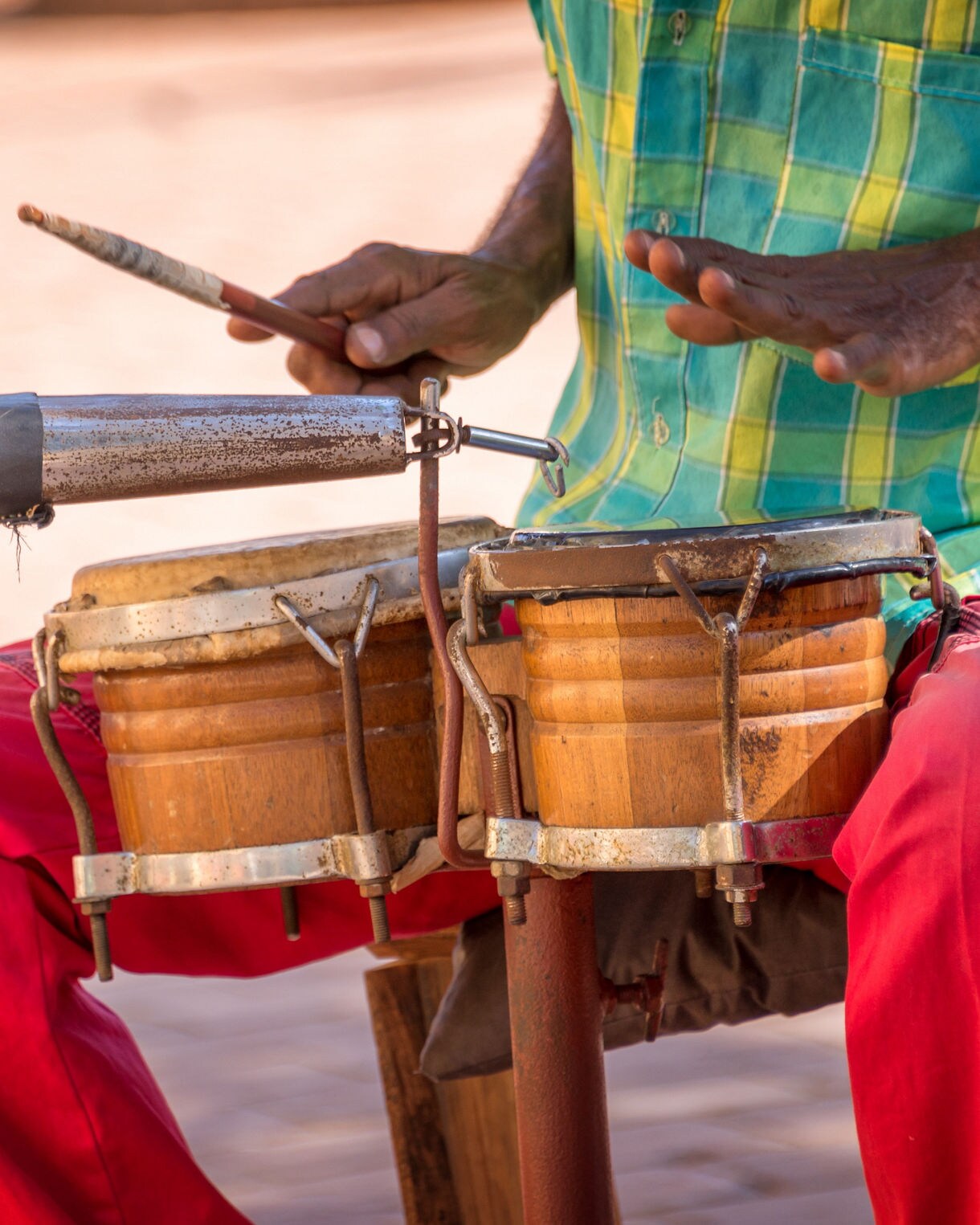 Street musician playing the drums.