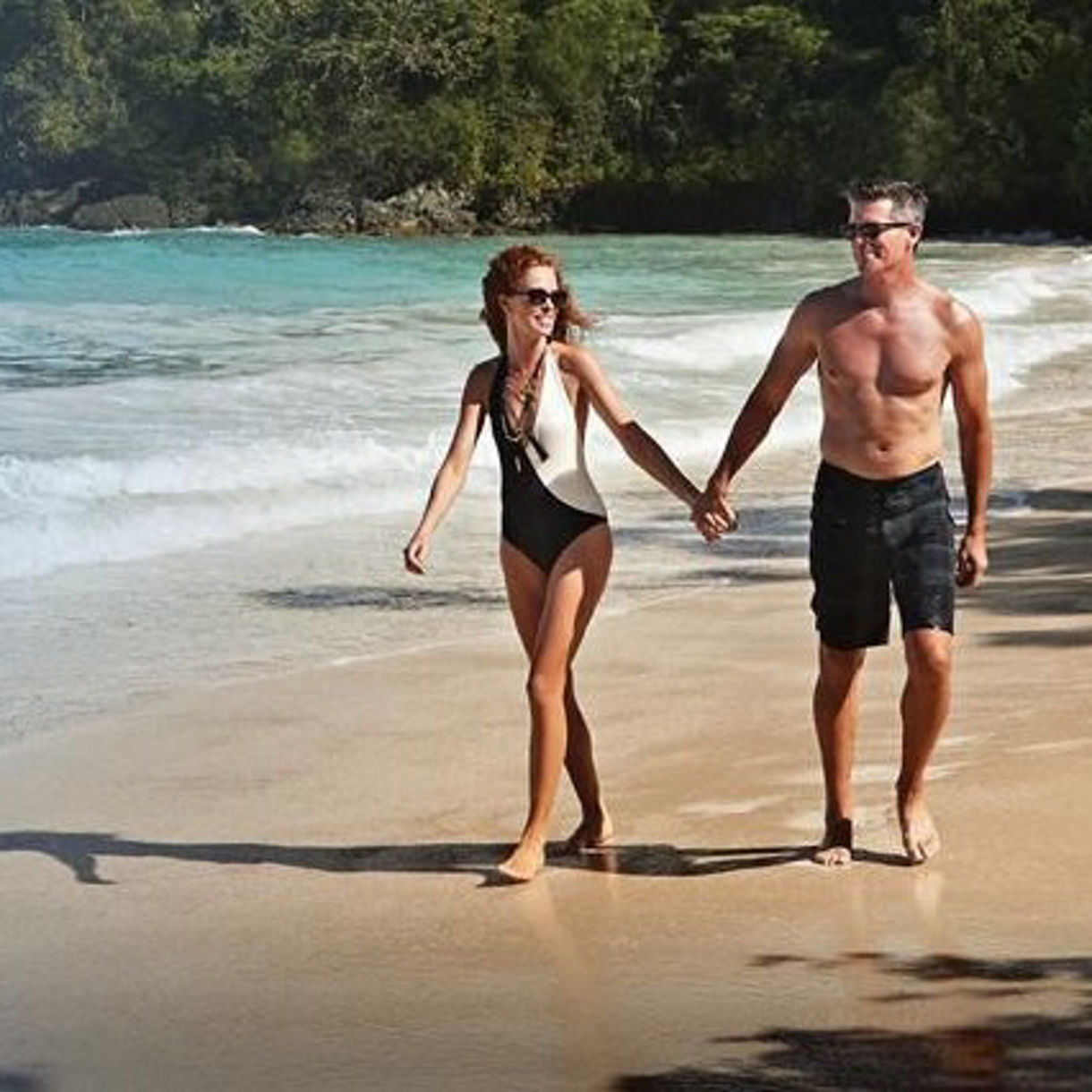 Luxury cruise ship sailing at vibrant sunset