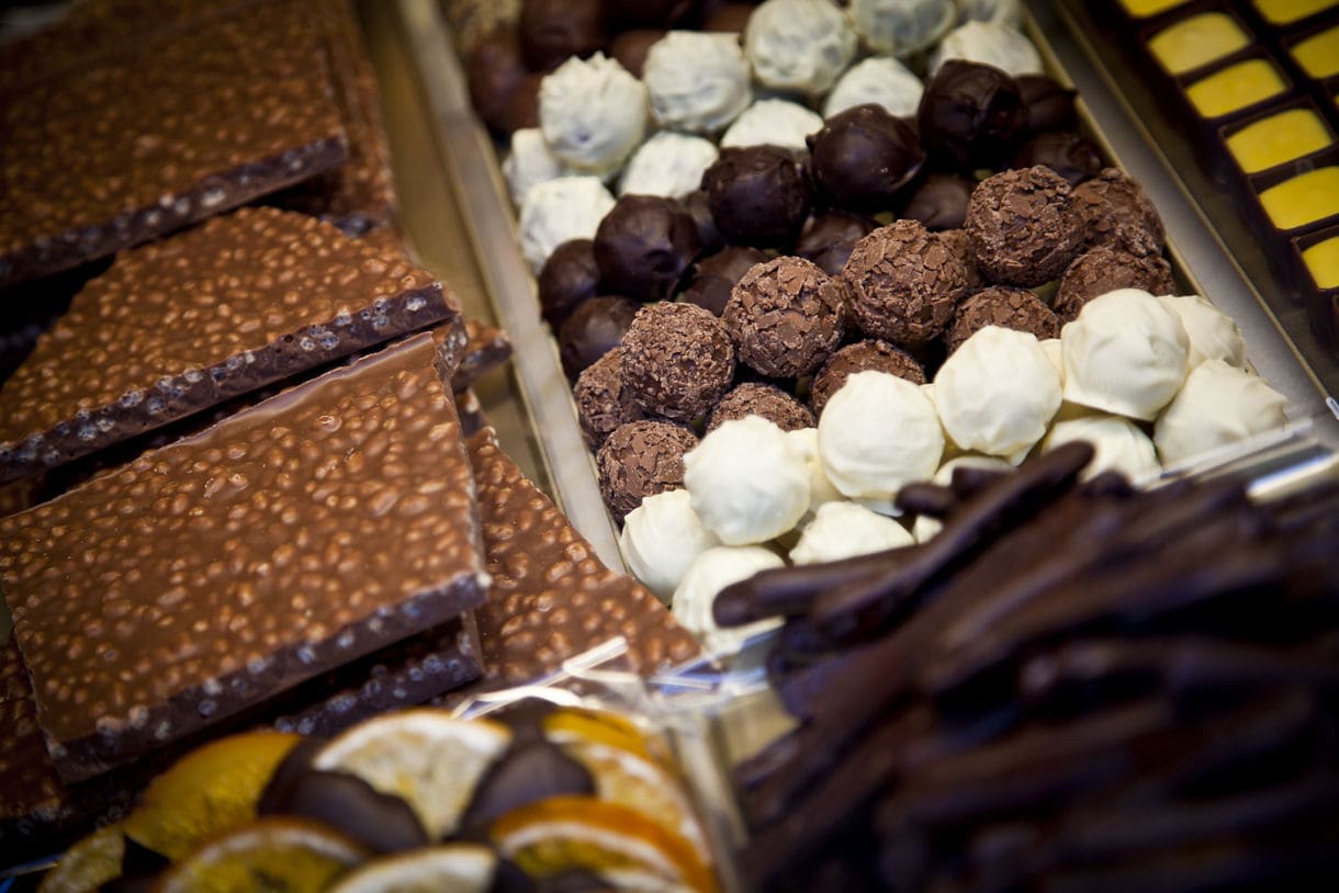 A decadent assortment of gourmet chocolates perfect for pairing.