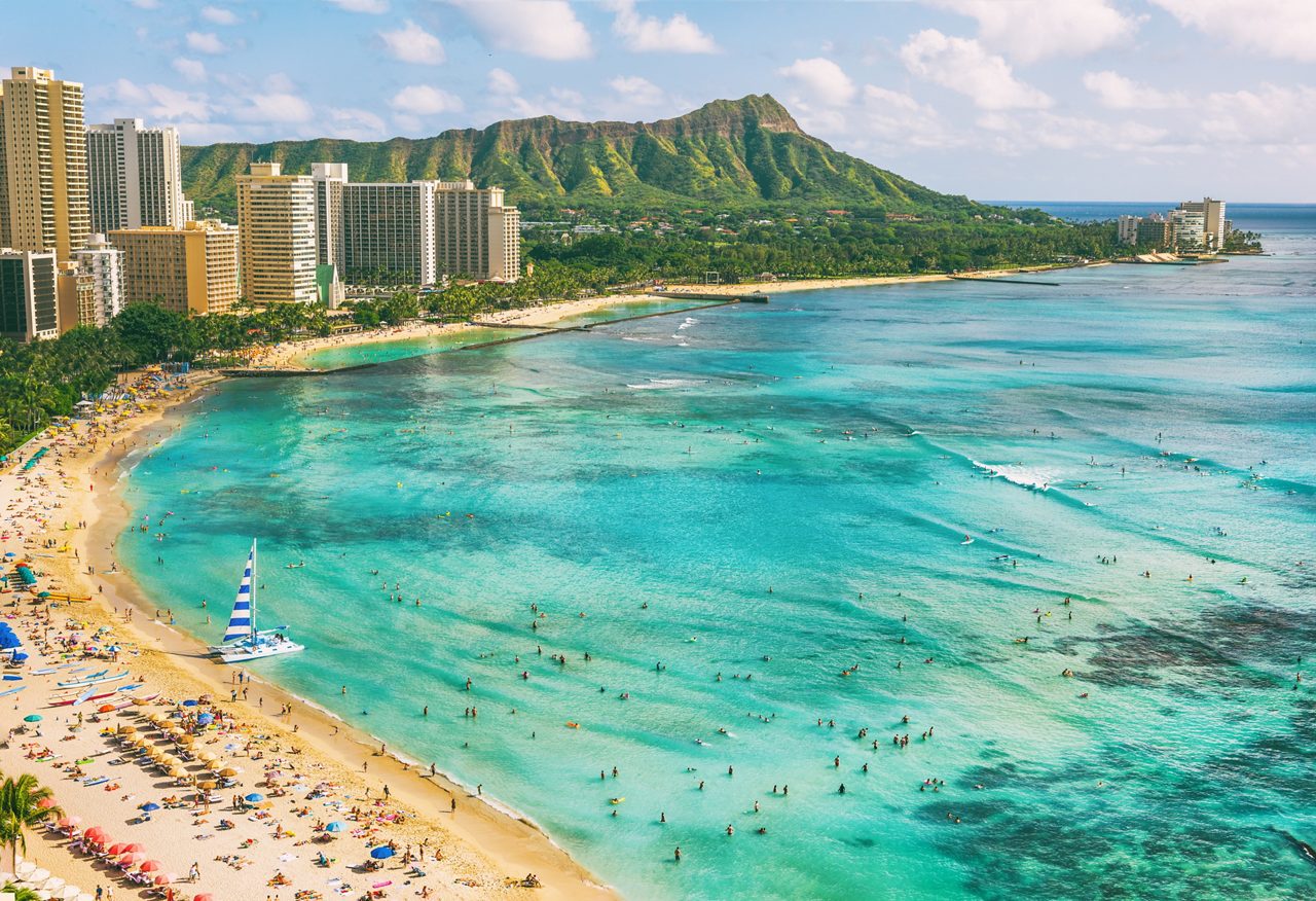 Hawaii waikiki beach in Honolulu city, aerial view of Diamond Head famous landmark travel destination.